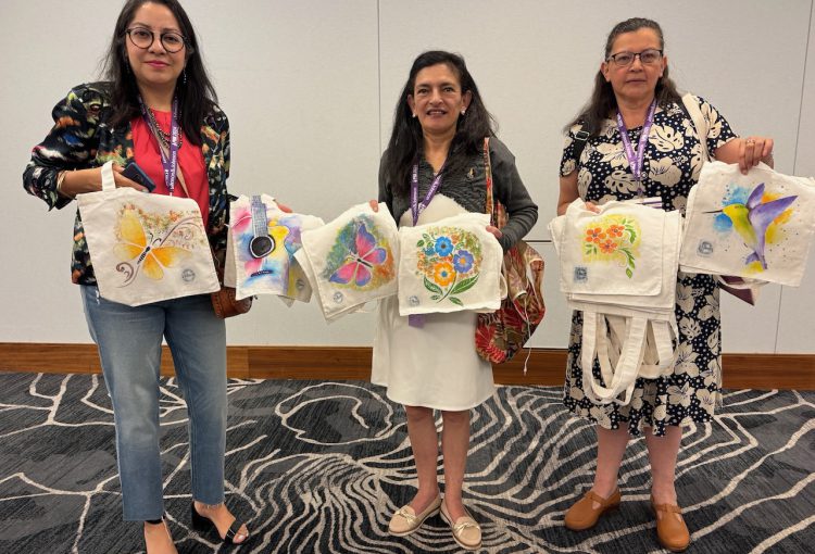 Participants from Latin America. Hand painted bags by PH patients.